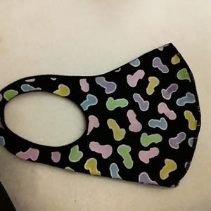 Mask with multicolored penises all over it
